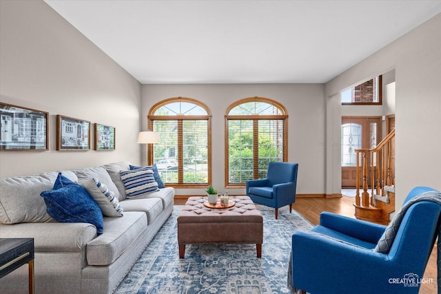 10660 Great Egret Dr, Orland Park, IL 60467 - living area with plenty of natural light, wood finished floors, and stairway