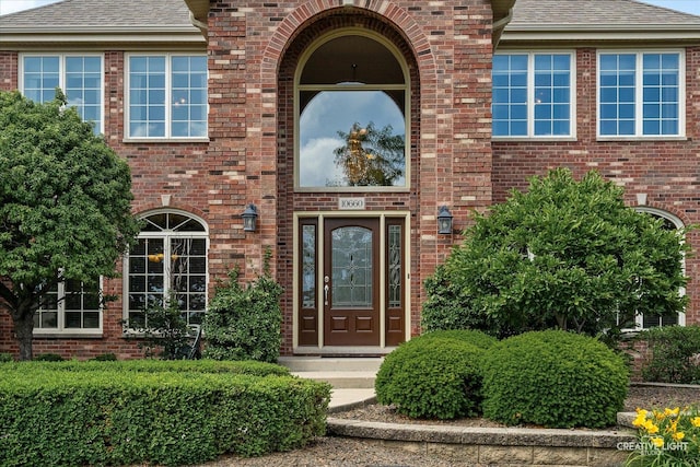 10660 Great Egret Dr, Orland Park, IL 60467 - entrance to property with a shingled roof and brick siding