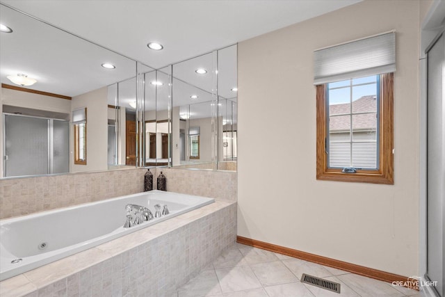 10660 Great Egret Dr, Orland Park, IL 60467 - full bath featuring a jetted tub, tile patterned floors, and recessed lighting