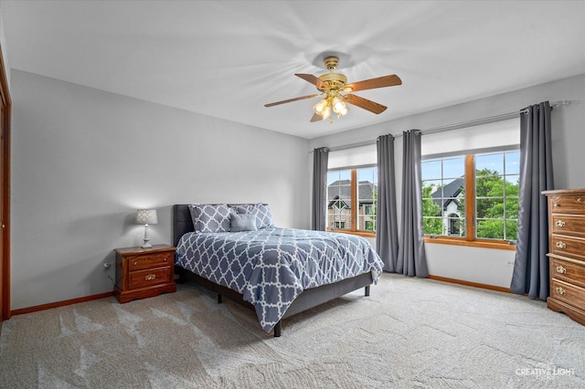 10660 Great Egret Dr, Orland Park, IL 60467 - carpeted bedroom with baseboards and ceiling fan