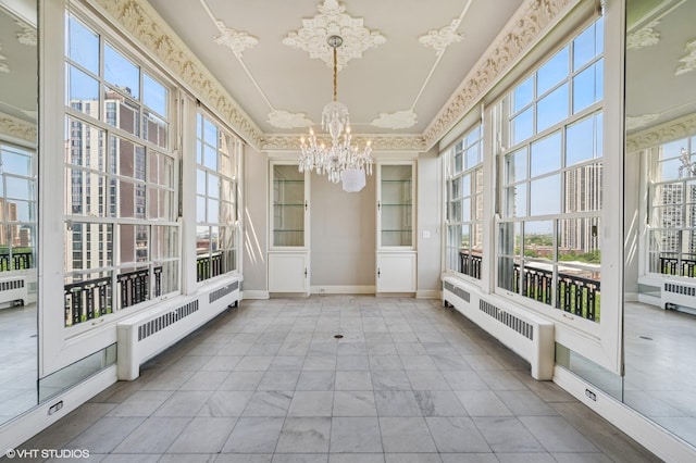 1550 N State Pkwy Unit 801, Chicago, IL 60610 - unfurnished sunroom featuring a chandelier and radiator heating unit