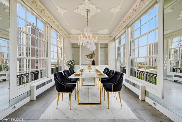 1550 N State Pkwy Unit 801, Chicago, IL 60610 - sunroom with radiator and a chandelier