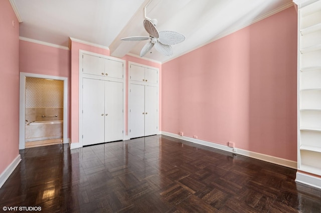 1550 N State Pkwy Unit 801, Chicago, IL 60610 - unfurnished bedroom featuring crown molding, two closets, and a ceiling fan