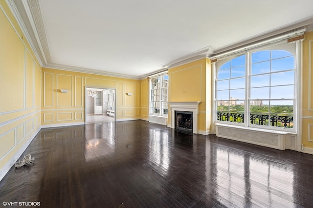 1550 N State Pkwy Unit 801, Chicago, IL 60610 - unfurnished living room with a decorative wall, ornamental molding, hardwood / wood-style flooring, and a fireplace