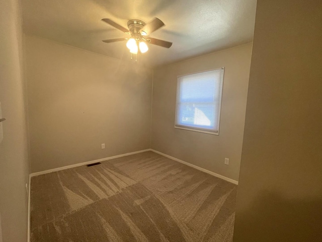 522 N 3rd Ave, Chenoa, IL 61726 - carpeted spare room featuring a ceiling fan and baseboards