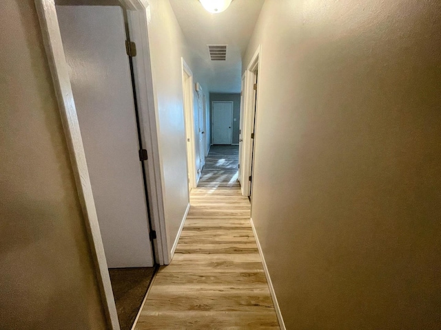 522 N 3rd Ave, Chenoa, IL 61726 - corridor featuring light wood-style floors and baseboards