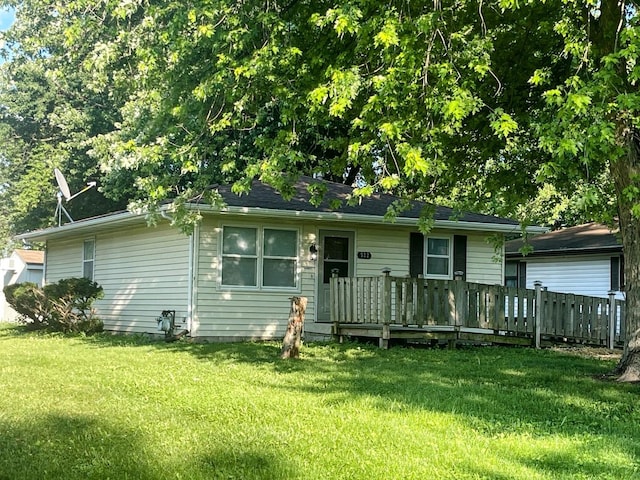 522 N 3rd Ave, Chenoa, IL 61726 - view of front of house featuring a front yard and a wooden deck