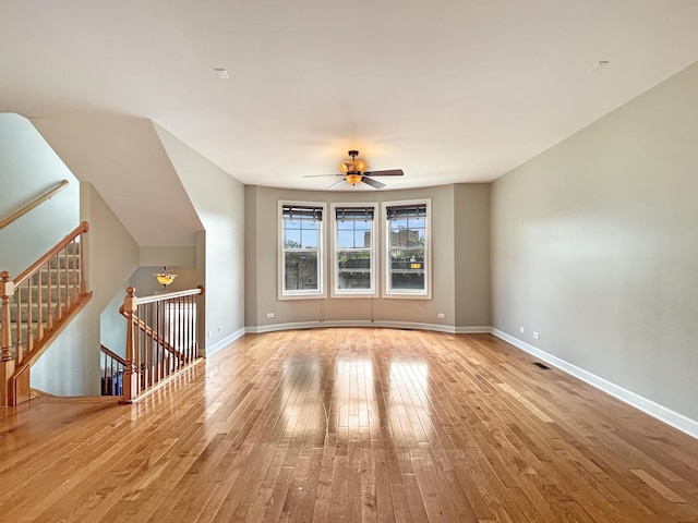 15 Busse Hwy, Park Ridge, IL 60068 - unfurnished living room featuring hardwood / wood-style flooring and ceiling fan