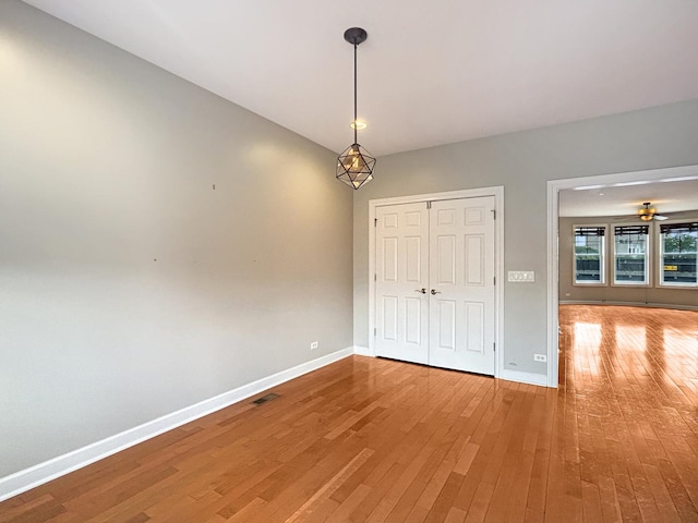 15 Busse Hwy, Park Ridge, IL 60068 - unfurnished dining area with light wood finished floors and ceiling fan