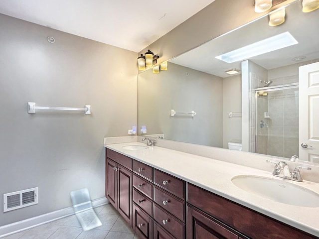 15 Busse Hwy, Park Ridge, IL 60068 - bathroom with tile patterned floors, double vanity, and tiled shower