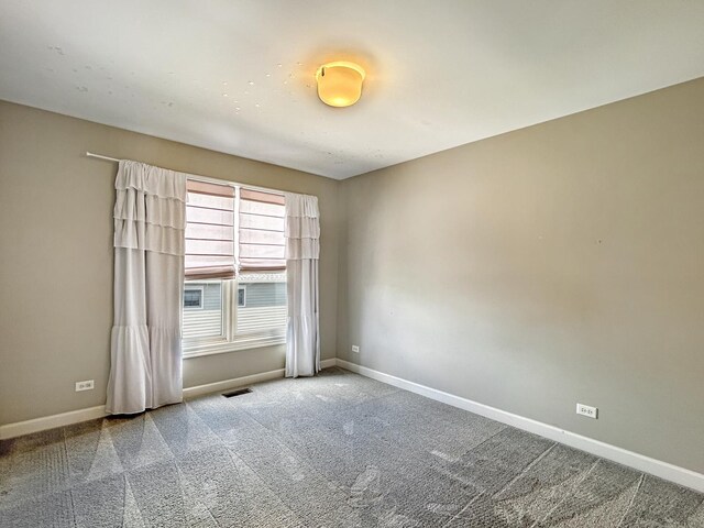 15 Busse Hwy, Park Ridge, IL 60068 - empty room featuring carpet and baseboards