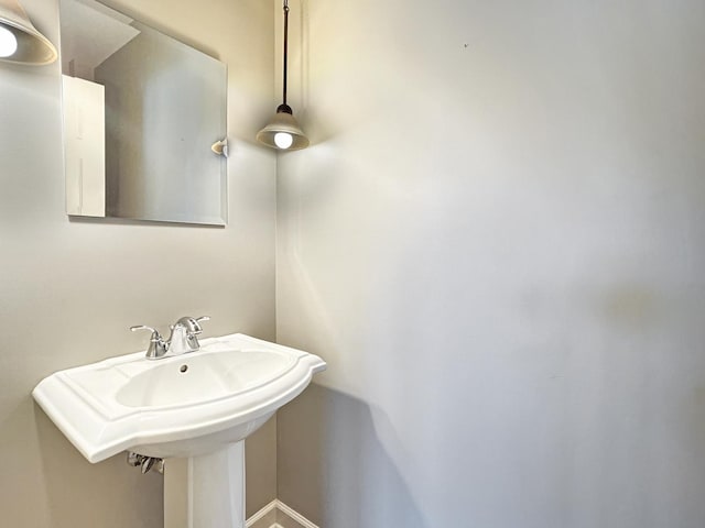 15 Busse Hwy, Park Ridge, IL 60068 - bathroom with a sink and baseboards