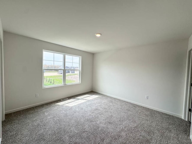 1100 58th Rd Unit 0020, Union Grove, WI 53182 - carpeted empty room with baseboards