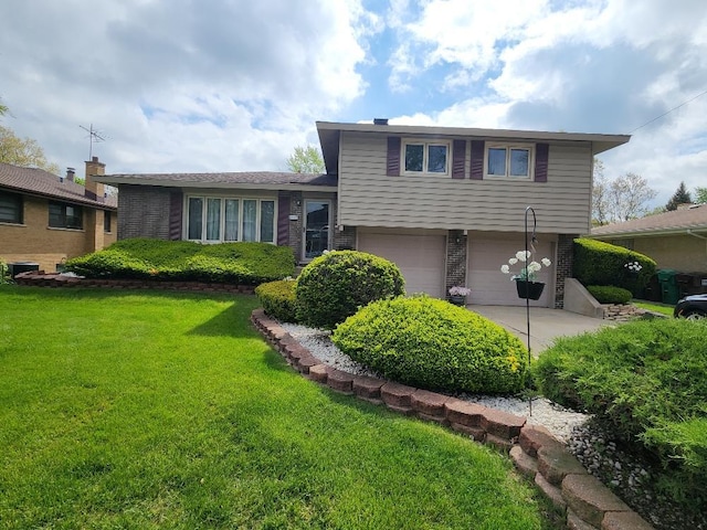 17227 70th Ave, Tinley Park, IL 60477 - split level home featuring brick siding, an attached garage, and a front lawn