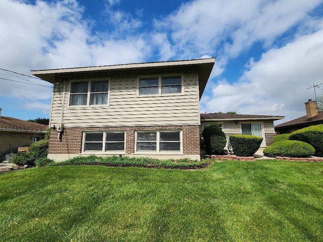 17227 70th Ave, Tinley Park, IL 60477 - view of front of house with brick siding and a front lawn
