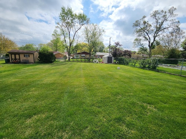 17227 70th Ave, Tinley Park, IL 60477 - view of yard with a storage shed