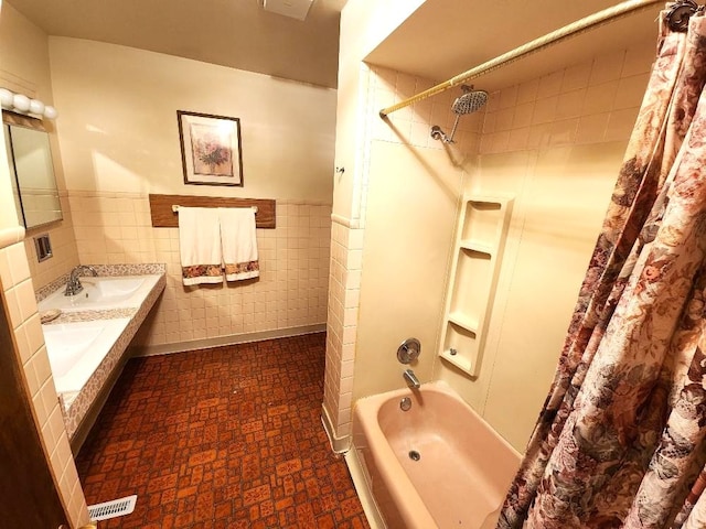 17227 70th Ave, Tinley Park, IL 60477 - full bath featuring shower / bath combination with curtain, double vanity, a wainscoted wall, and tile walls