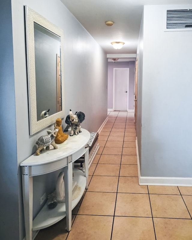 5801 N Sheridan Rd Unit 8A, Chicago, IL 60660 - corridor with light tile patterned floors and baseboards