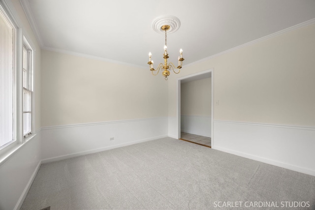 532 E Hawthorne Blvd, Wheaton, IL 60187 - carpeted empty room featuring a chandelier, healthy amount of natural light, and ornamental molding