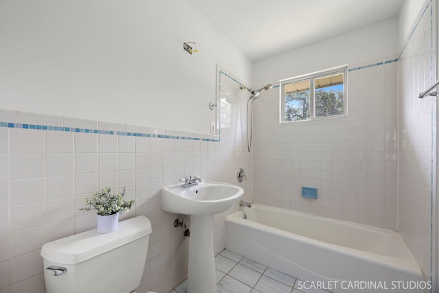 532 E Hawthorne Blvd, Wheaton, IL 60187 - bathroom featuring bathing tub / shower combination, tile walls, and tile patterned flooring