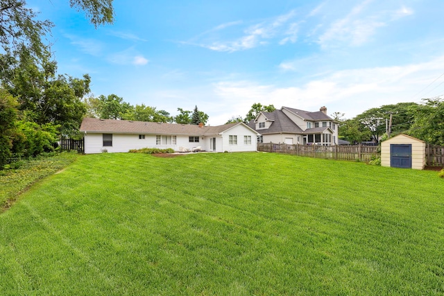 532 E Hawthorne Blvd, Wheaton, IL 60187 - rear view of house featuring a shed and a fenced backyard