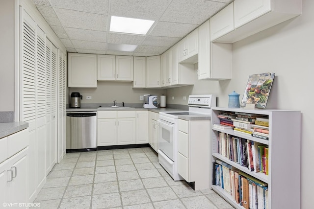 8S241 Dunham Dr, Naperville, IL 60540 - kitchen with white range with electric cooktop, stainless steel dishwasher, a drop ceiling, white cabinets, and light countertops