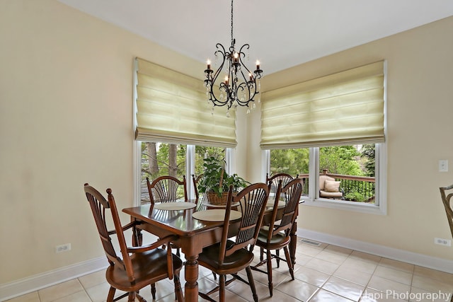 4 Shadow Creek Ct, Lake In The Hills, IL 60156 - dining space featuring a chandelier and light tile patterned floors