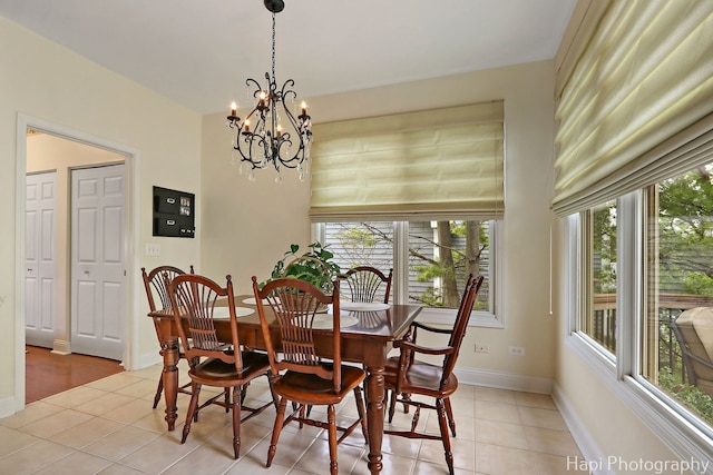 4 Shadow Creek Ct, Lake In The Hills, IL 60156 - dining room featuring light tile patterned flooring and a chandelier
