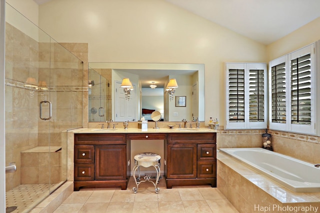 4 Shadow Creek Ct, Lake In The Hills, IL 60156 - full bathroom featuring a garden tub, tile patterned flooring, a shower stall, lofted ceiling, and double vanity