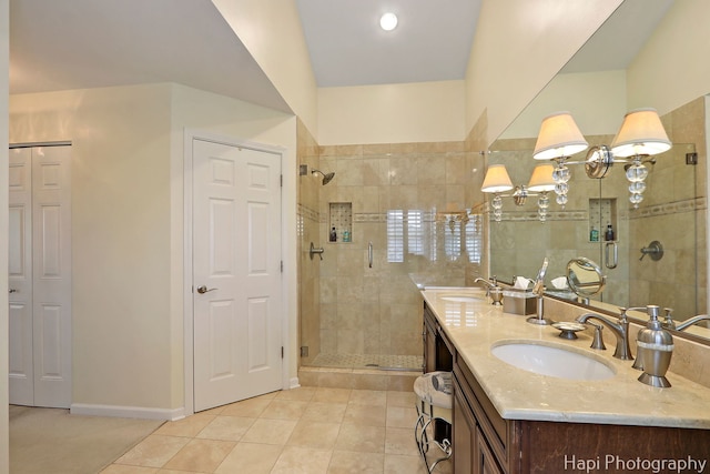 4 Shadow Creek Ct, Lake In The Hills, IL 60156 - bathroom featuring a shower stall, double vanity, a closet, and tile patterned flooring