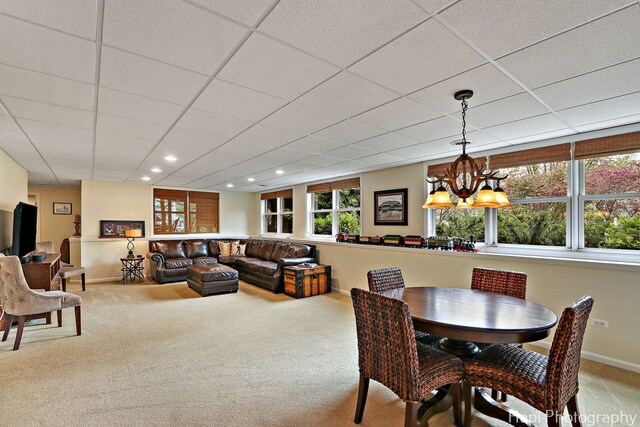 4 Shadow Creek Ct, Lake In The Hills, IL 60156 - carpeted dining space with plenty of natural light, a chandelier, and recessed lighting