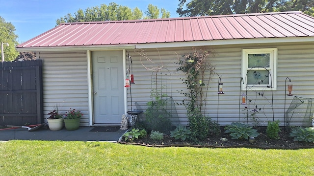 306 N Joy St, Tampico, IL 61283 - view of exterior entry featuring a metal roof