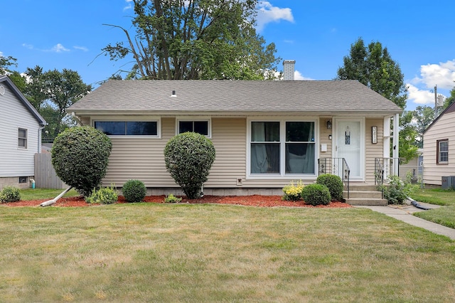 3414 Franklin St, Highland, IN 46322 - view of front facade featuring a chimney and a front yard
