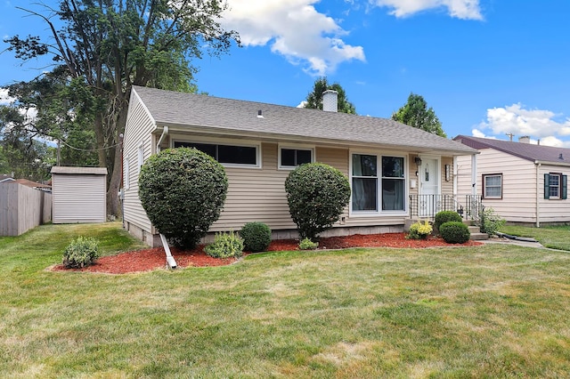 3414 Franklin St, Highland, IN 46322 - view of front facade with a shed, a chimney, and a front lawn