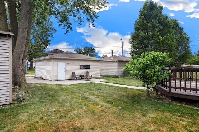 3414 Franklin St, Highland, IN 46322 - rear view of house featuring a lawn, a deck, and a patio area