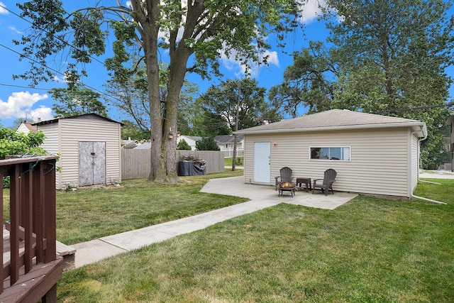 3414 Franklin St, Highland, IN 46322 - view of yard featuring a patio and a storage unit