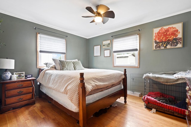 3414 Franklin St, Highland, IN 46322 - bedroom with wood finished floors, ornamental molding, and a ceiling fan