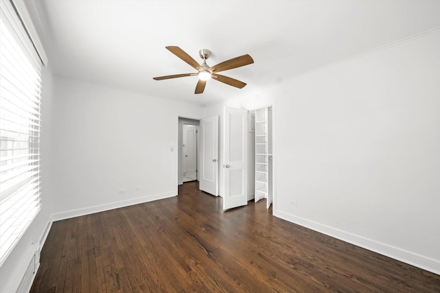 2228 Central St Unit 3, Evanston, IL 60201 - unfurnished bedroom featuring dark wood-type flooring and ceiling fan