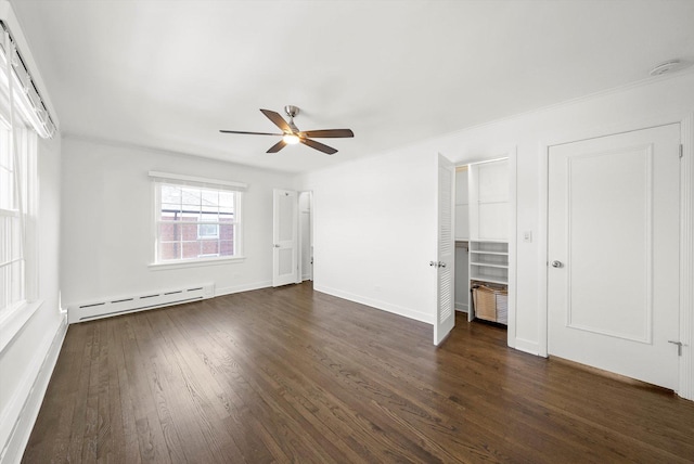 2228 Central St Unit 3, Evanston, IL 60201 - unfurnished living room with baseboard heating, ceiling fan, dark wood finished floors, and crown molding