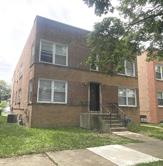 4907 Hull St, Skokie, IL 60077 - townhome / multi-family property featuring brick siding