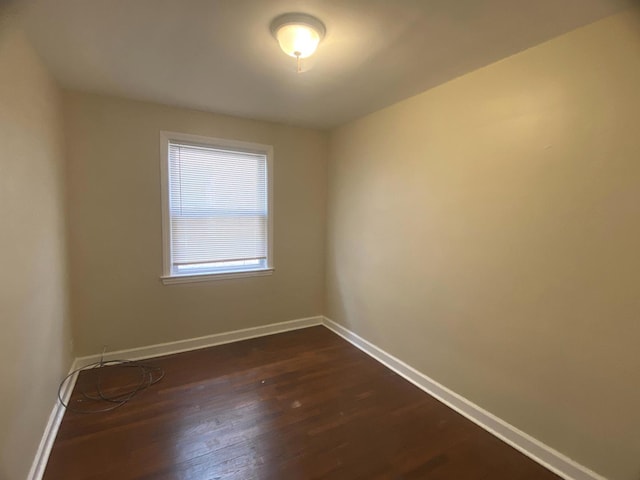 4907 Hull St, Skokie, IL 60077 - unfurnished room with dark wood finished floors