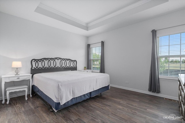 3385 Pecos Cir, Montgomery, IL 60538 - bedroom featuring a tray ceiling, wood finished floors, and crown molding