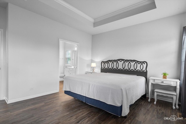 3385 Pecos Cir, Montgomery, IL 60538 - bedroom with ornamental molding, dark wood finished floors, a tray ceiling, and ensuite bathroom
