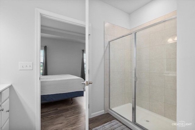 3385 Pecos Cir, Montgomery, IL 60538 - full bathroom with ensuite bath, wood finished floors, a stall shower, and vanity