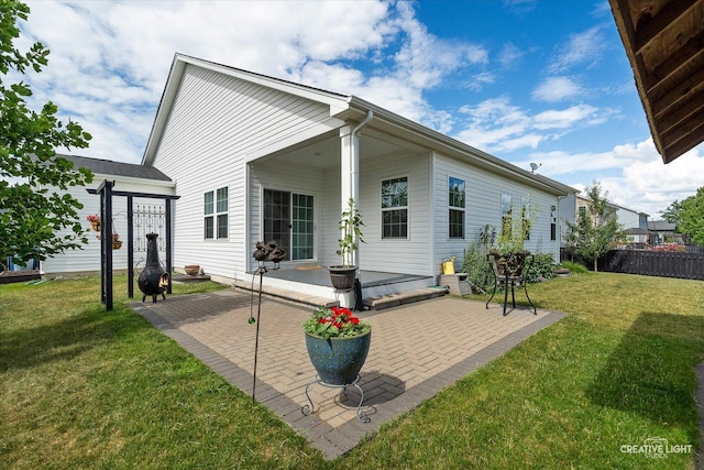 3385 Pecos Cir, Montgomery, IL 60538 - back of house with a patio