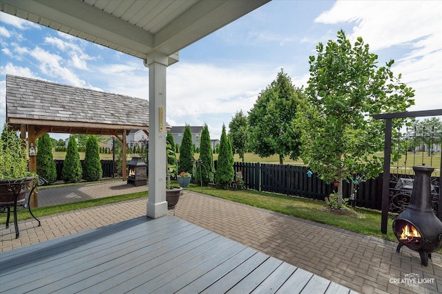 3385 Pecos Cir, Montgomery, IL 60538 - wooden deck featuring a fenced backyard and a patio area