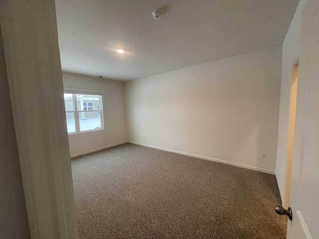2522 Redwood Trl, Wonder Lake, IL 60097 - spare room featuring carpet flooring and a smoke detector