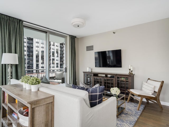 421 W Huron St Unit 1005, Chicago, IL 60654 - living area featuring wood finished floors and baseboards