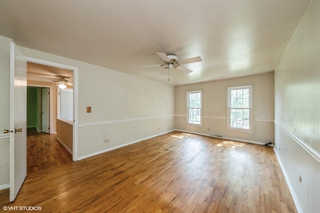316 Ambleside Dr, Roselle, IL 60172 - empty room featuring light wood-style flooring and ceiling fan