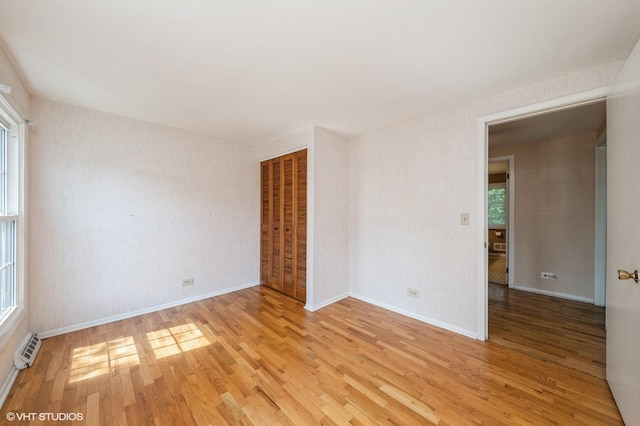 316 Ambleside Dr, Roselle, IL 60172 - spare room with light wood finished floors and baseboards